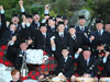 Band members stop to celebrate winning the 2011 Cowal Championship, completing the Grand Slam