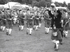 Marching off the field after capturing the 1993 World Championships - Pictured in front are Derrick Neil with the trophy, Drum Major Joanne Ussher, front rank of Pipe Major Richard Parkes, Ian Neil, Mark Smyth & Nigel Davison, while Gary Scullion, Don Bradford & Brian Martin can be seen in the second rank