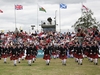 Marching out of the Grade 1 arena at the World Pipe Band Championships in 2006 - Front rank left to right is Pipe Sergeant Alastair Dunn, Scott Drummond, Graeme Roy, Ryan Canning, Gordon McCready, Mark Smyth & Pipe Major Richard Parkes MBE