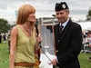 Pipe Major Richard Parkes MBE with television personality Jackie Bird, hosting the 2006 BBC programme covering the Worlds